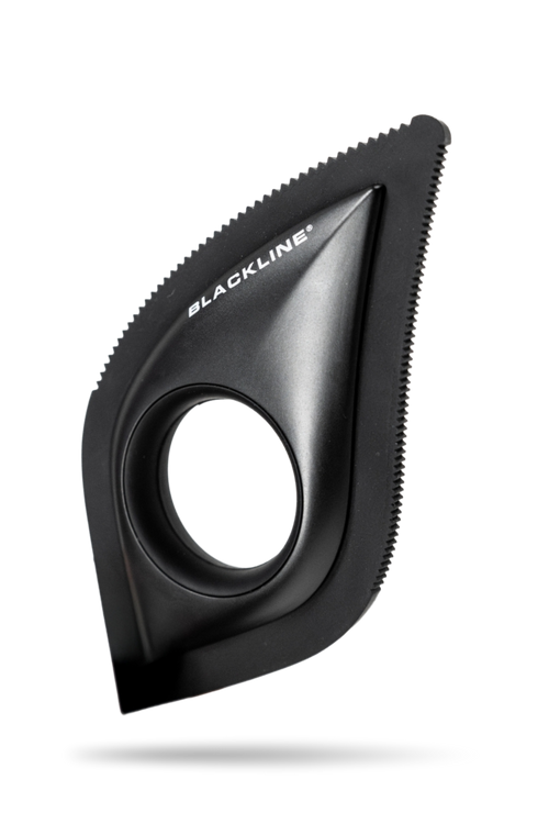 Black BLACKLINE pet hair removal brush with textured edges and a circular hand grip